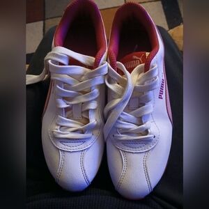 Pink and white puma sneakers